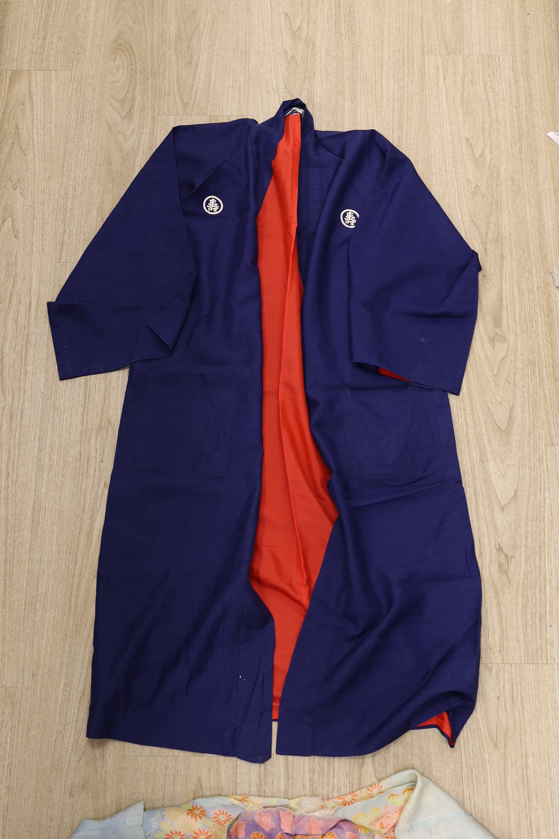 A Japanese navy blue silk kimono and another multi coloured silk ,patterned kimono from the 1930’s